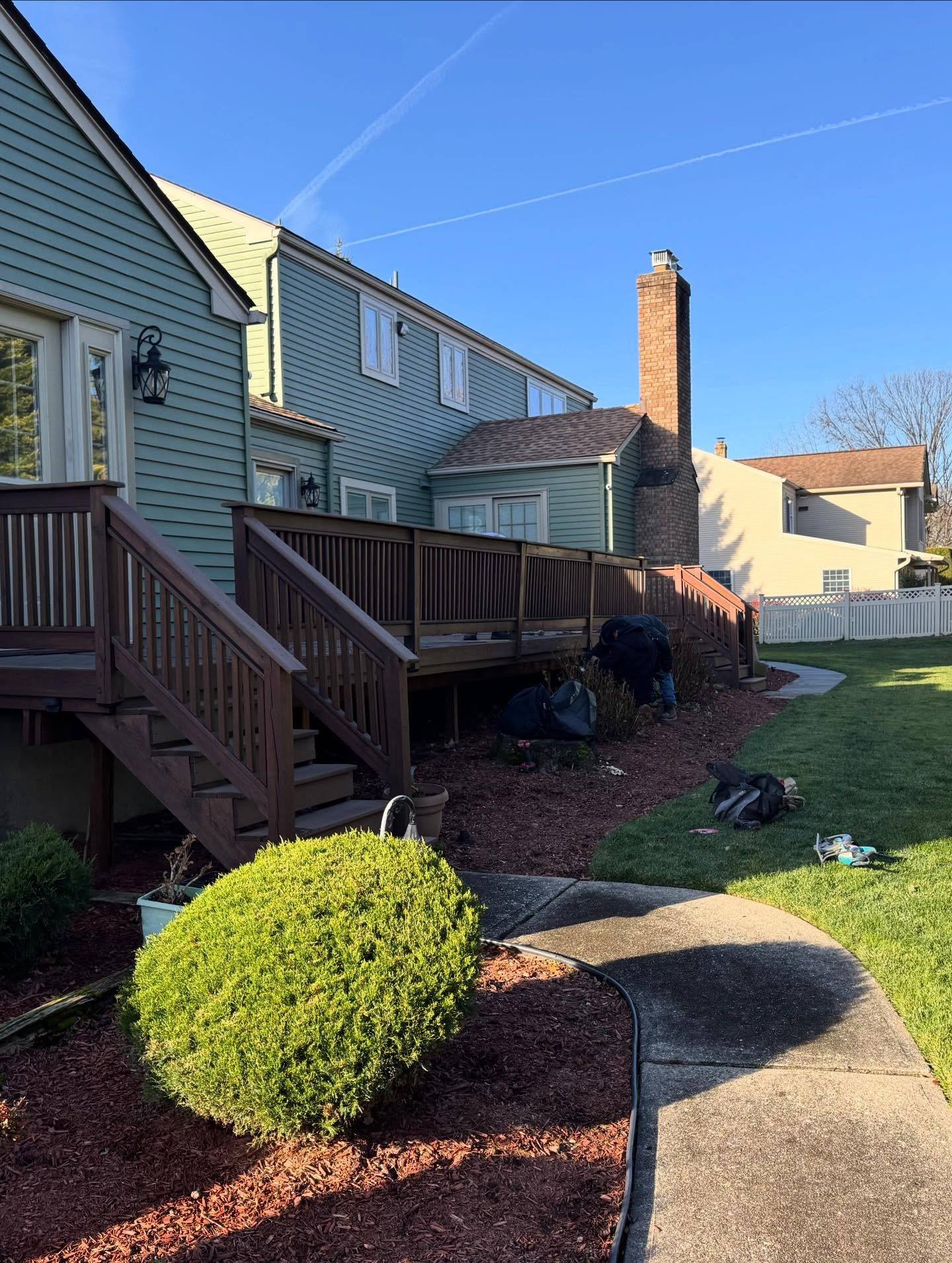 The old brown timber deck and stairs on the Oradell house before demolition
