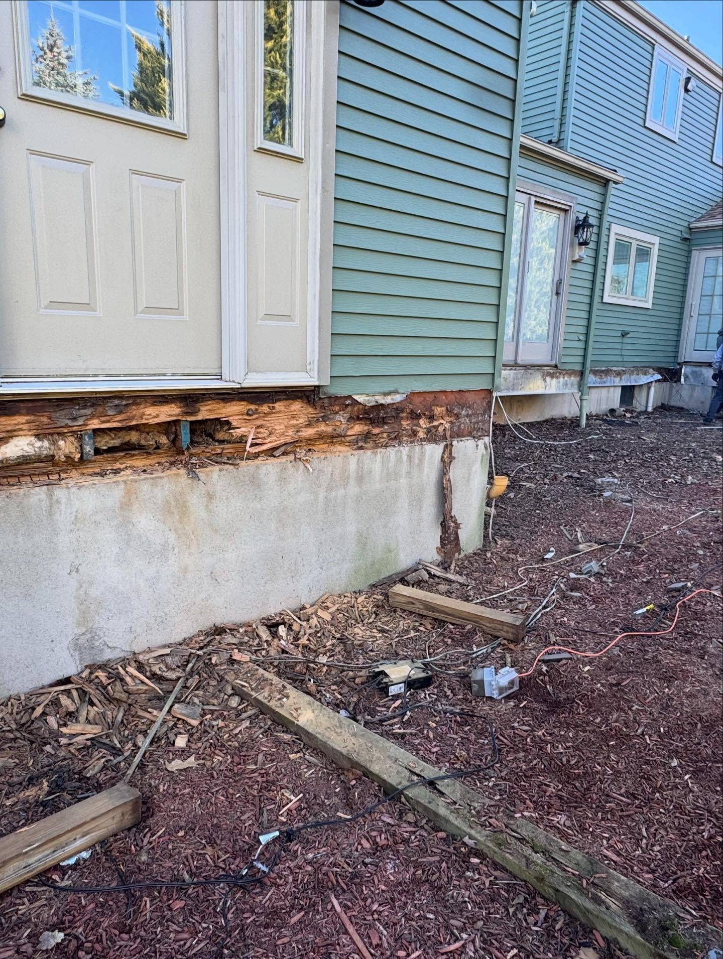 The old deck off the Oradell house, with the weathered timber along the house wall exposed