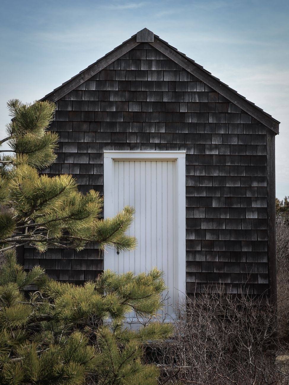 Cedar shake shingles on a steep roof