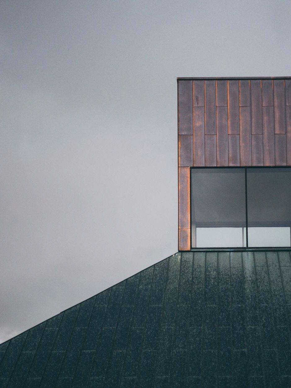 Copper roof and flashing weathering to patina